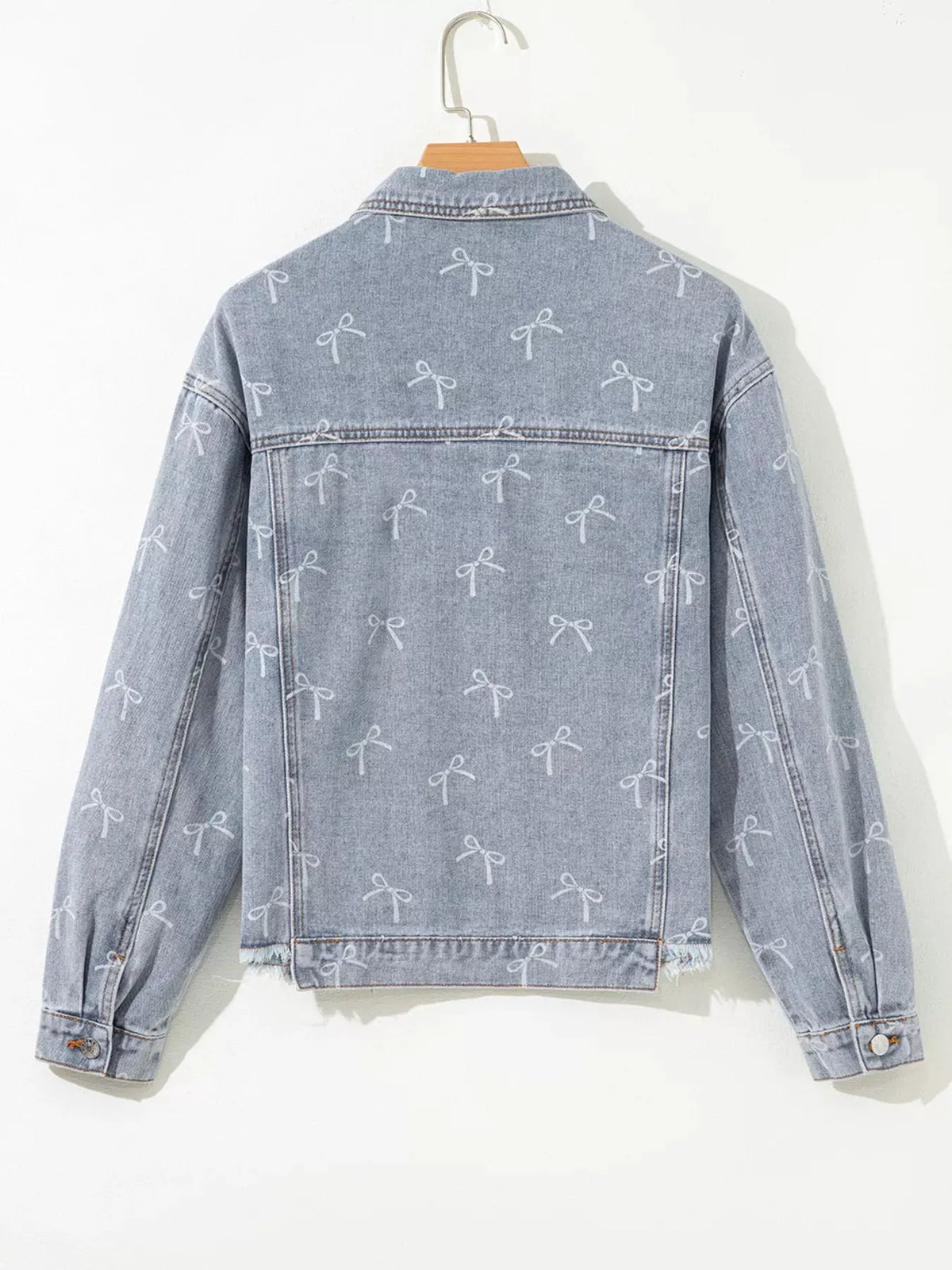 Bow Knot Print Light Wash Raw Hem Denim Jacket by Partner Label