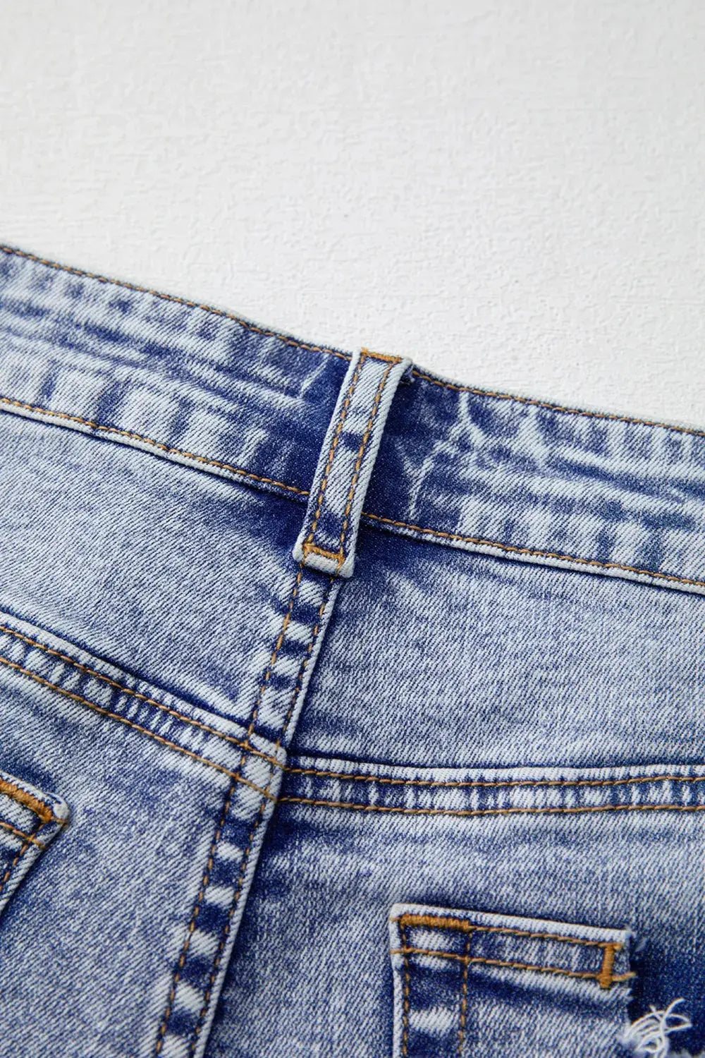 Pearl Studded Pockets Raw Hem Denim Shorts by Partner Label