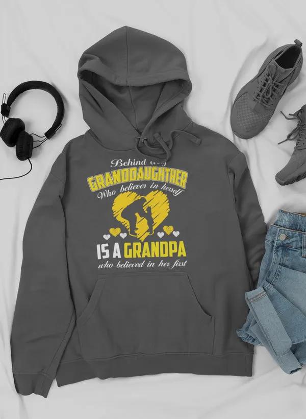 Behind Every Granddaughter Who Believes In Herself Is A Grandpa Hoodie by Merch