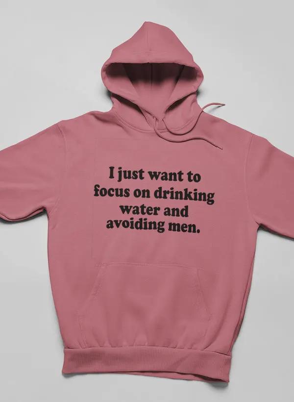 I Just Want to Focus On Drinking Water And Avoiding Men Hoodie by Merch