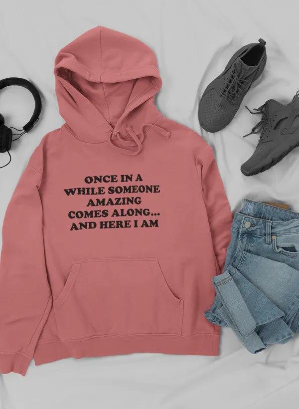 Once In A While Someone Amazing Comes Along And Here Hoodie by Merch