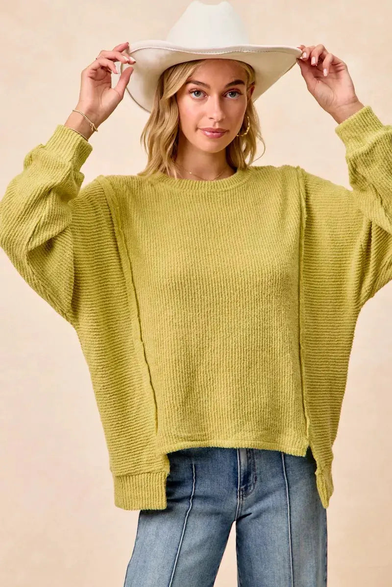 BiBi Boucle Rib Knit Uneven Hem Sweater With Open Seam by BiBi