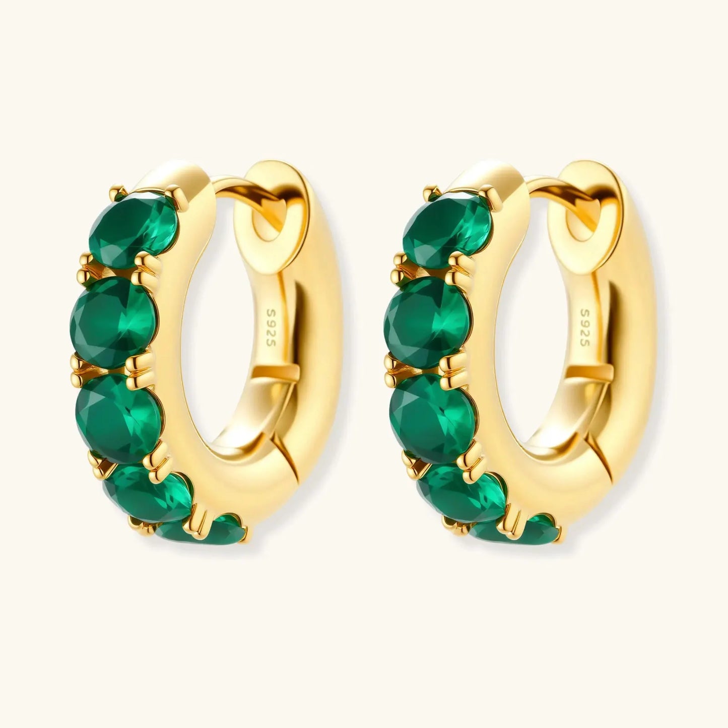 Emerald Huggie Hoops by Equanimity Essence.