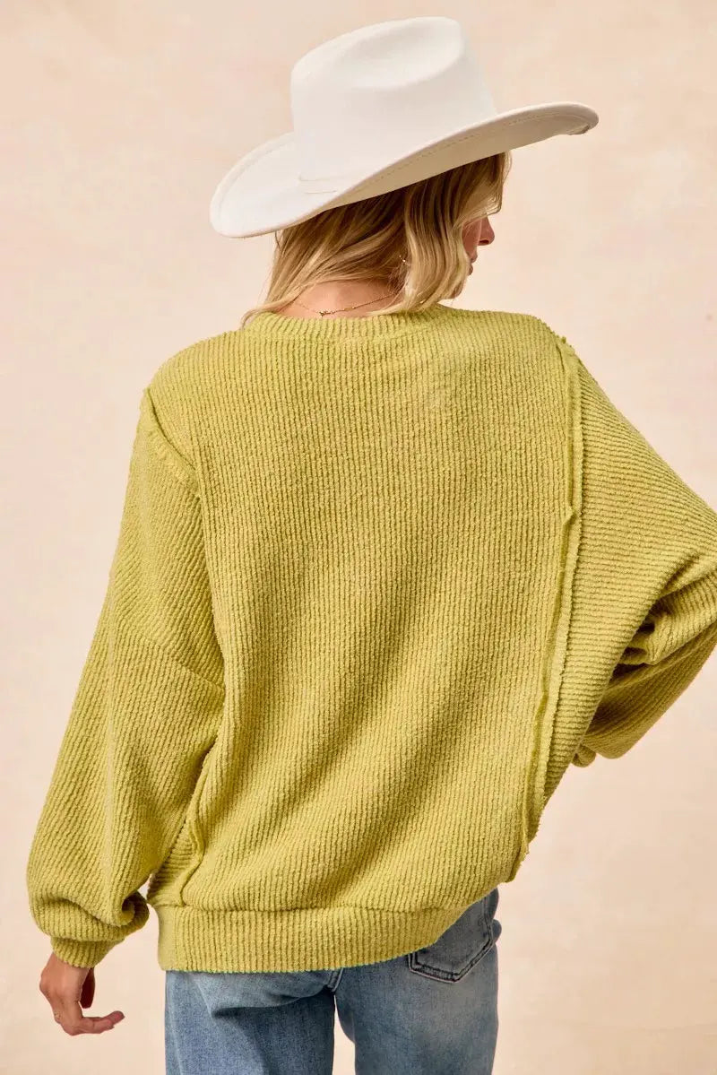 BiBi Boucle Rib Knit Uneven Hem Sweater With Open Seam by BiBi