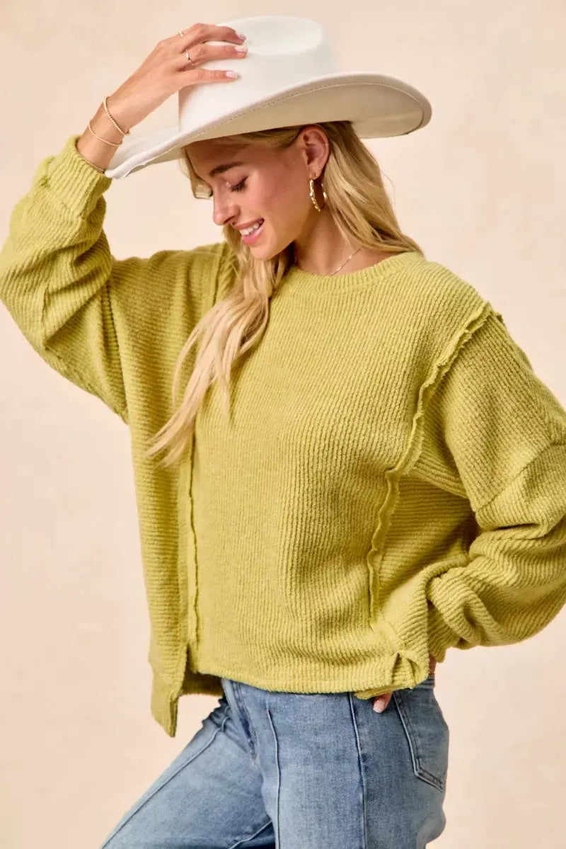BiBi Boucle Rib Knit Uneven Hem Sweater With Open Seam by BiBi