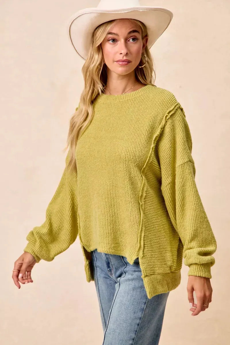 BiBi Boucle Rib Knit Uneven Hem Sweater With Open Seam by BiBi