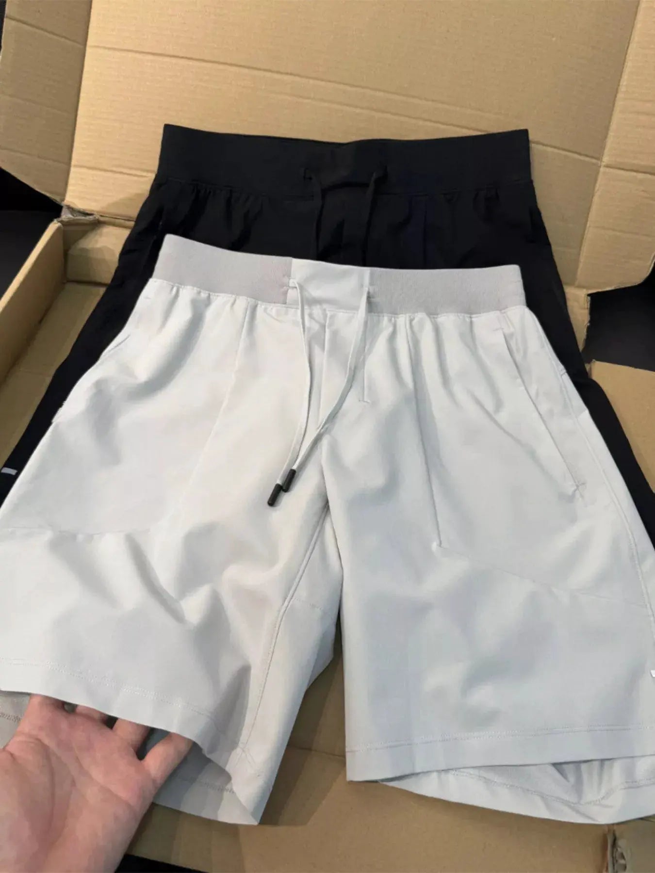 Men's Plus Size Lightweight Athletic Shorts with Drawstring Waist by Trendsi