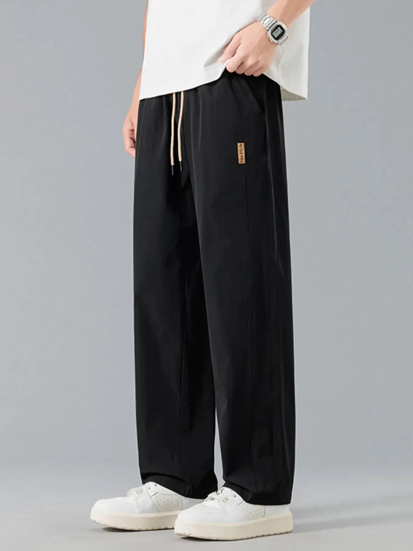 Men's Plus Size Loose Fit Drawstring Casual Pants by Trendsi