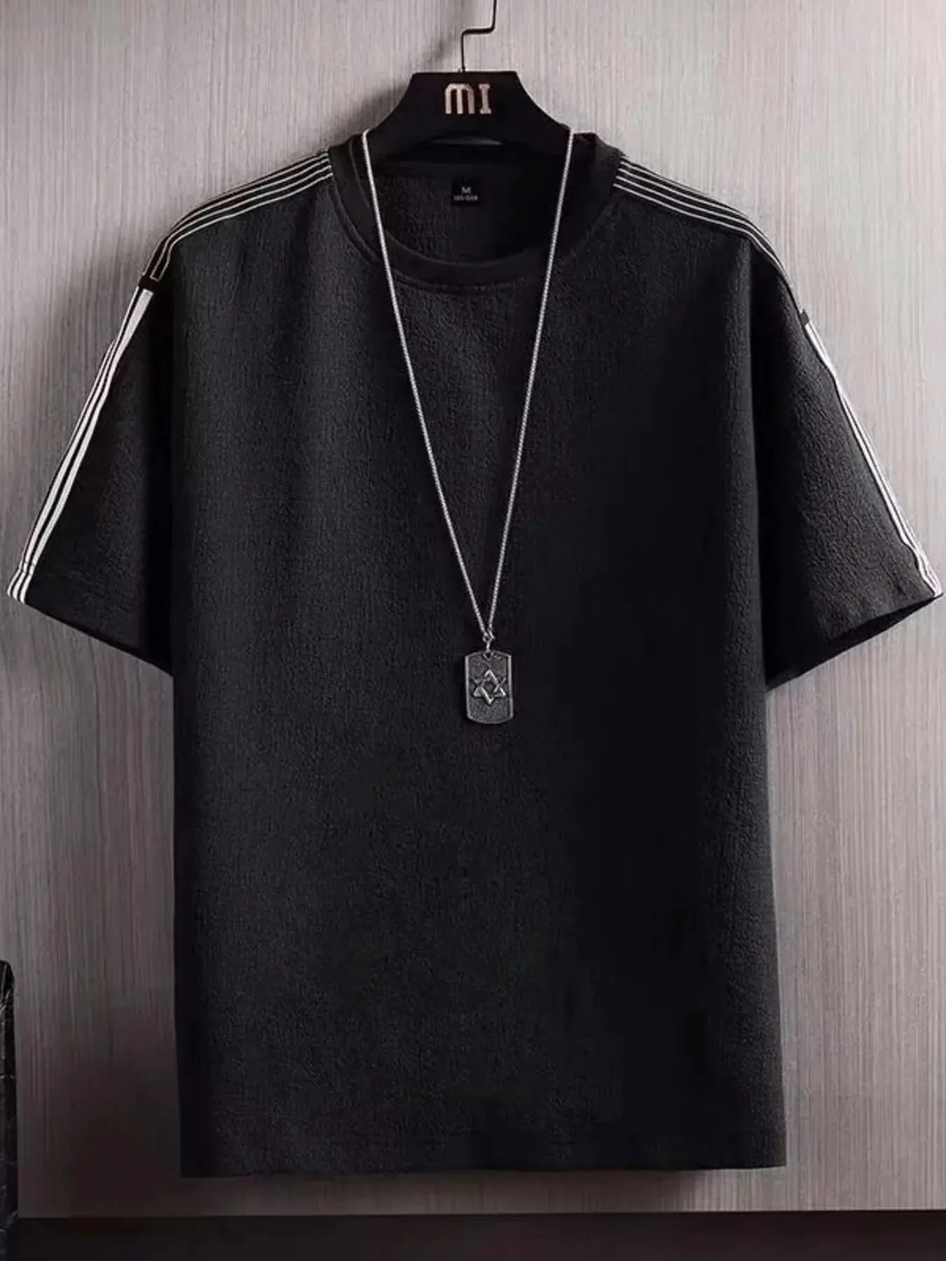Men's Plus Size Textured Round Neck T-Shirt by Trendsi