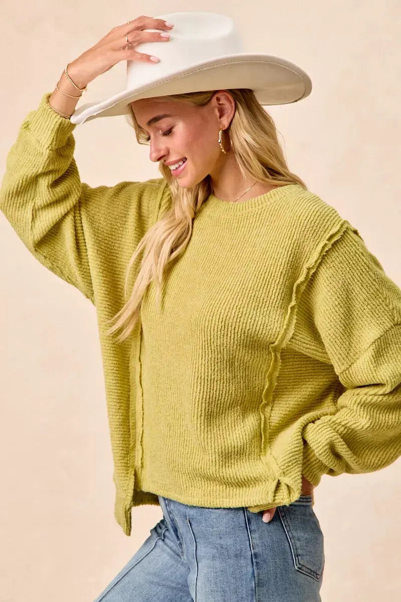 BiBi Boucle Rib Knit Uneven Hem Sweater With Open Seam by BiBi