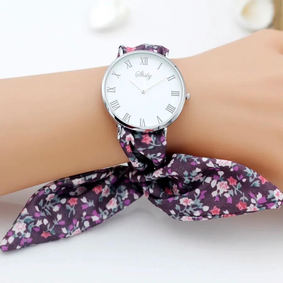 Shsby Brand New Lady Flower Cloth Wristwatch Roman Silver Women Dress Watch High Quality Fabric Watch Sweet Girls Bracelet Watch by Equanimity Essence.