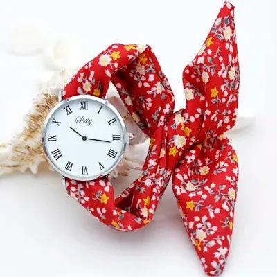 Shsby Brand New Lady Flower Cloth Wristwatch Roman Silver Women Dress Watch High Quality Fabric Watch Sweet Girls Bracelet Watch by Equanimity Essence.