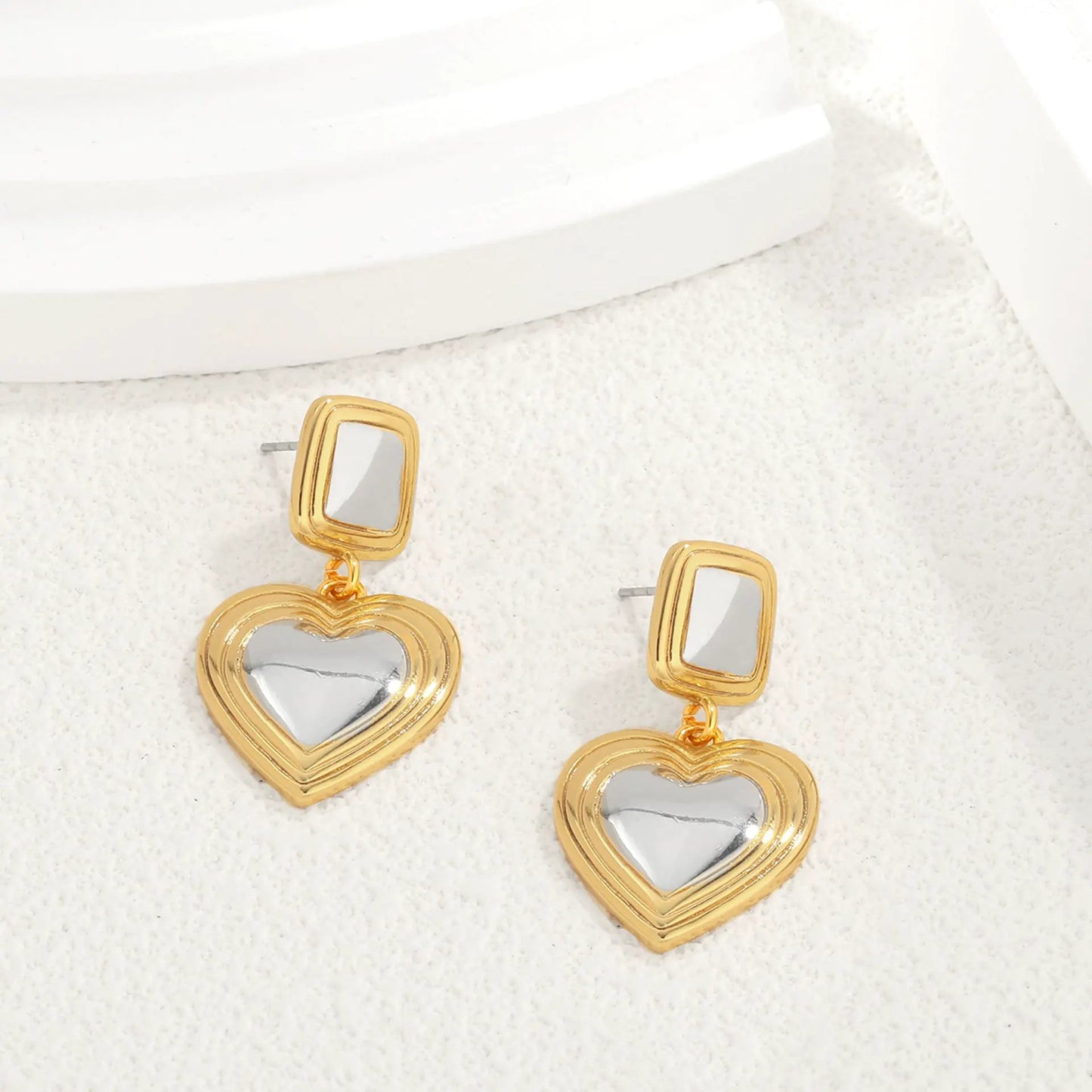 Light luxury fashion two tone earrings with a high-end feel, heart-shaped earrings with a heart shape, retro palace style peach heart earrings by Dropsure