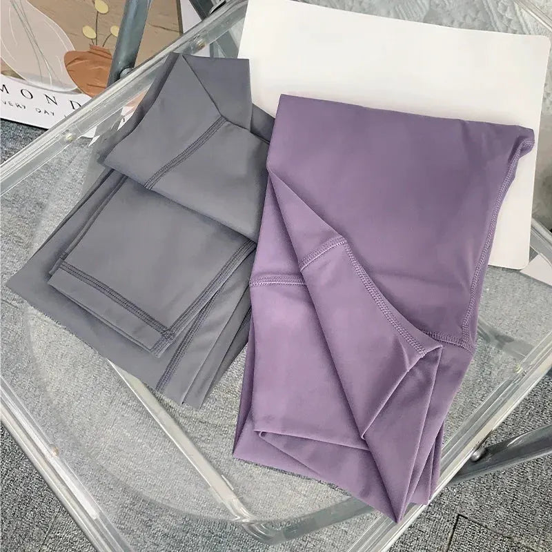 Women’s High-Waist Ankle-Length Yoga Leggings with Elastic Waist and Seam Pockets by Vimost Shop