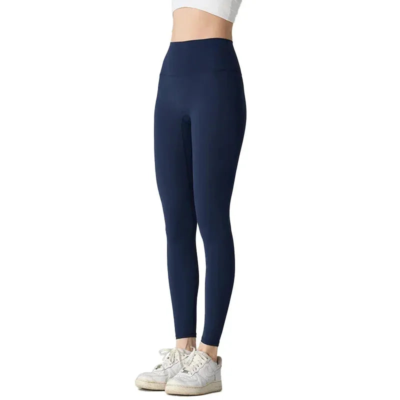 Women’s High-Waist Ankle-Length Yoga Leggings with Elastic Waist and Seam Pockets by Vimost Shop
