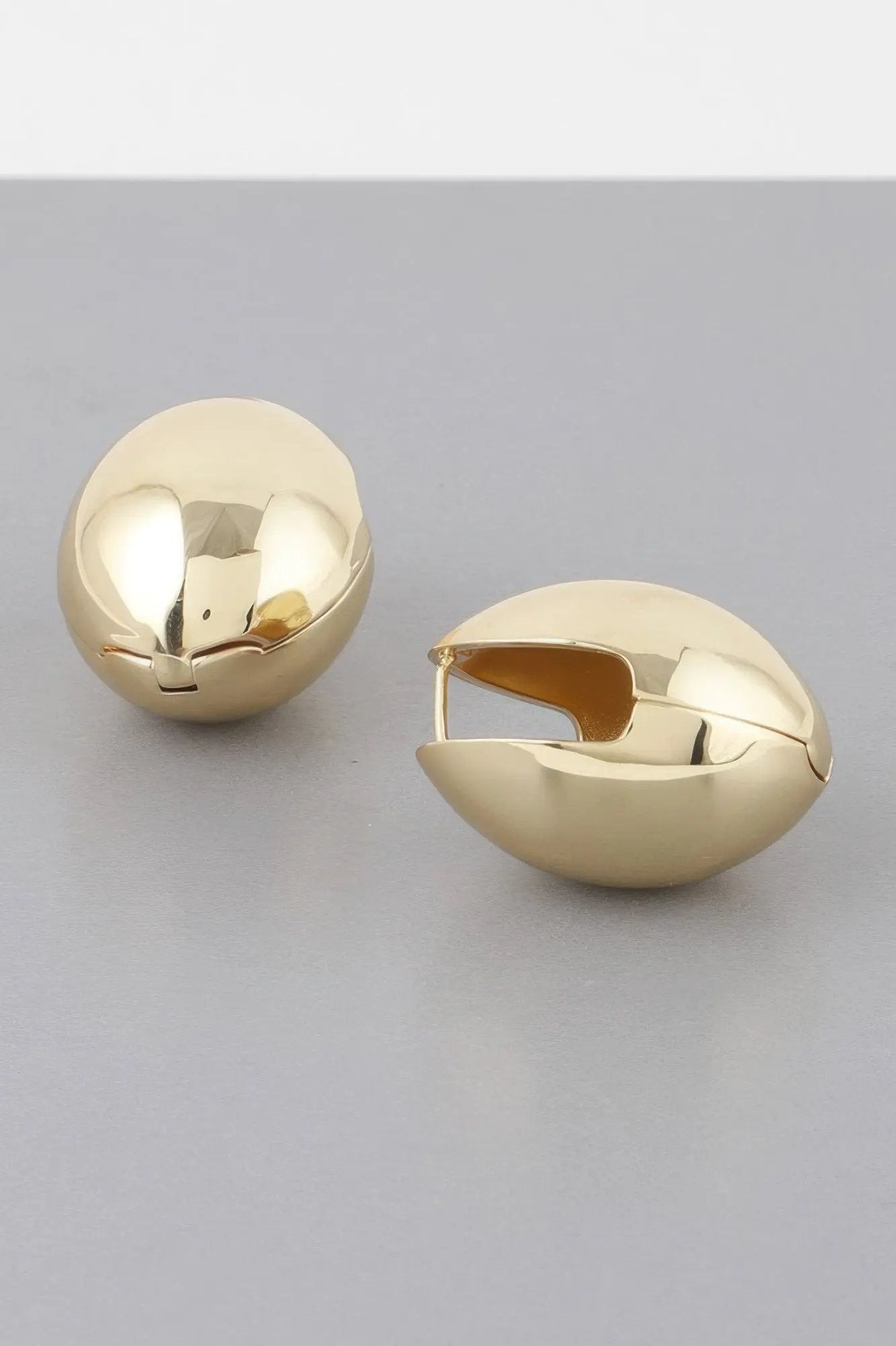TRIBECA Empty Shell Clasp Earrings: NYFW BYMANYC ® New York by BYMANYC ® New York
