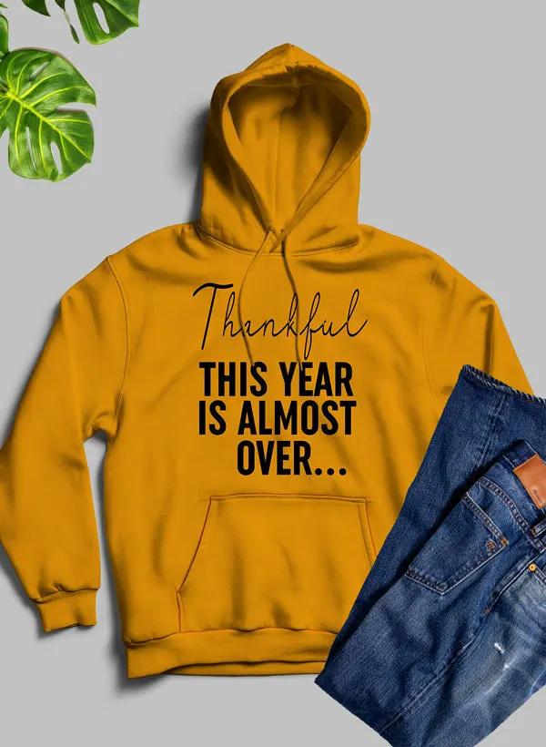 Thankful This Year Is Almost Over Hoodie by Merch