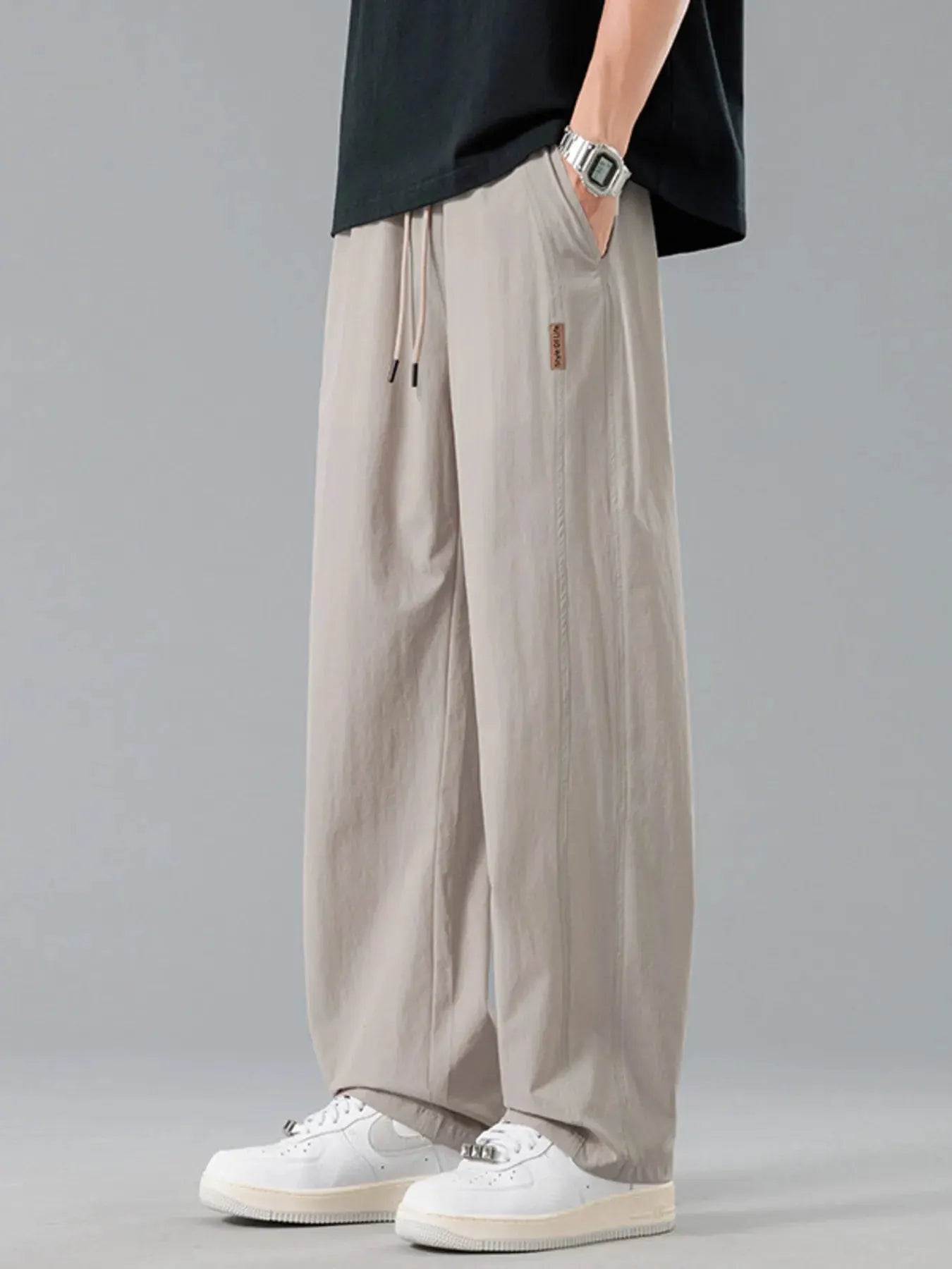 Men's Plus Size Loose Fit Drawstring Casual Pants by Trendsi