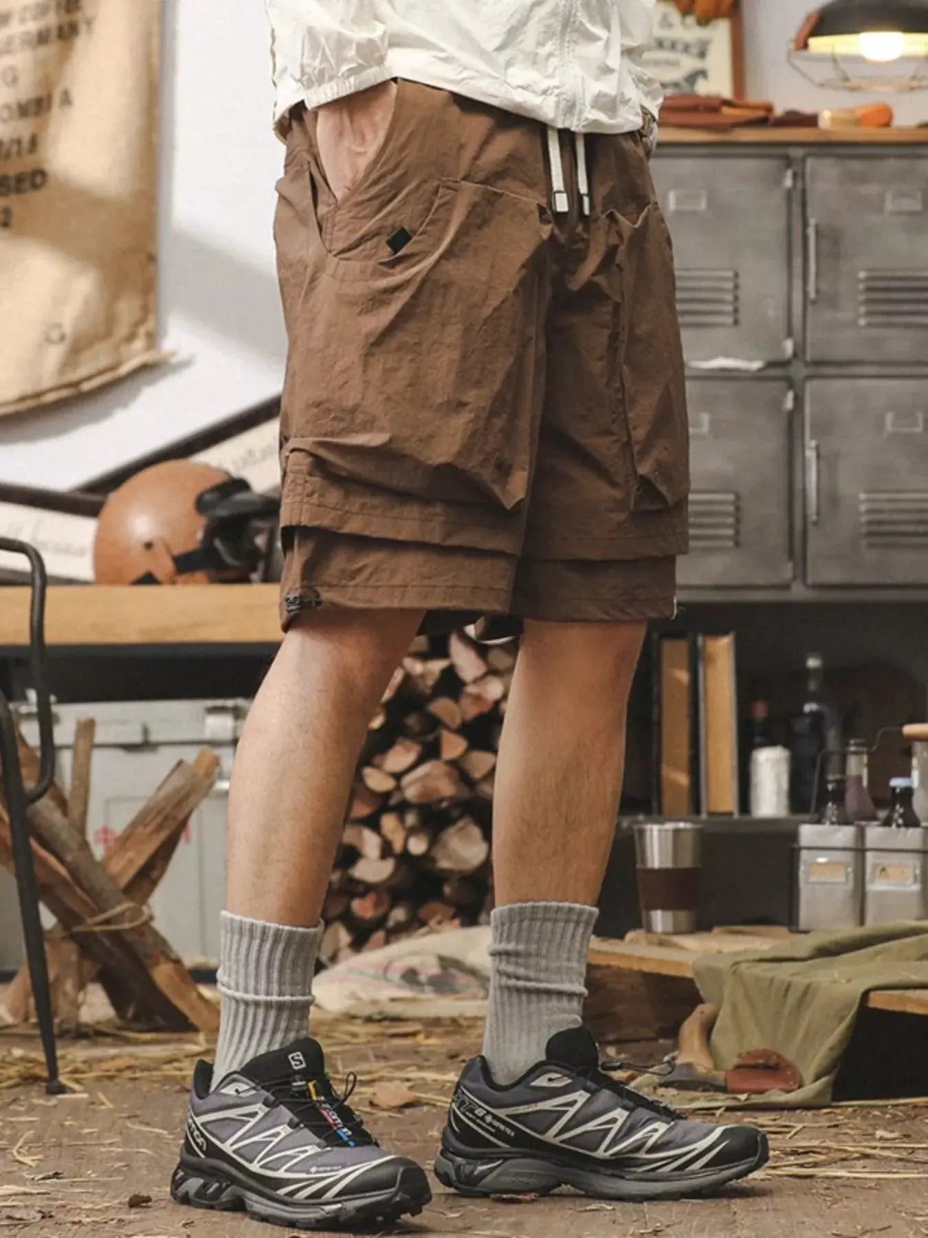 Men's Plus Size Multiple Pocket Layered Cargo Shorts with Drawstring Hem by Trendsi