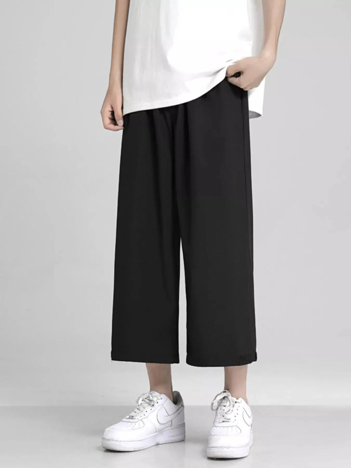 Men's Full Size Loose Fit Cropped Pants Plus Size by Trendsi