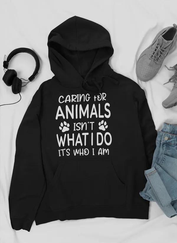 Caring for Animals Isn't What I Do It's Who I Am Hoodie by Merch
