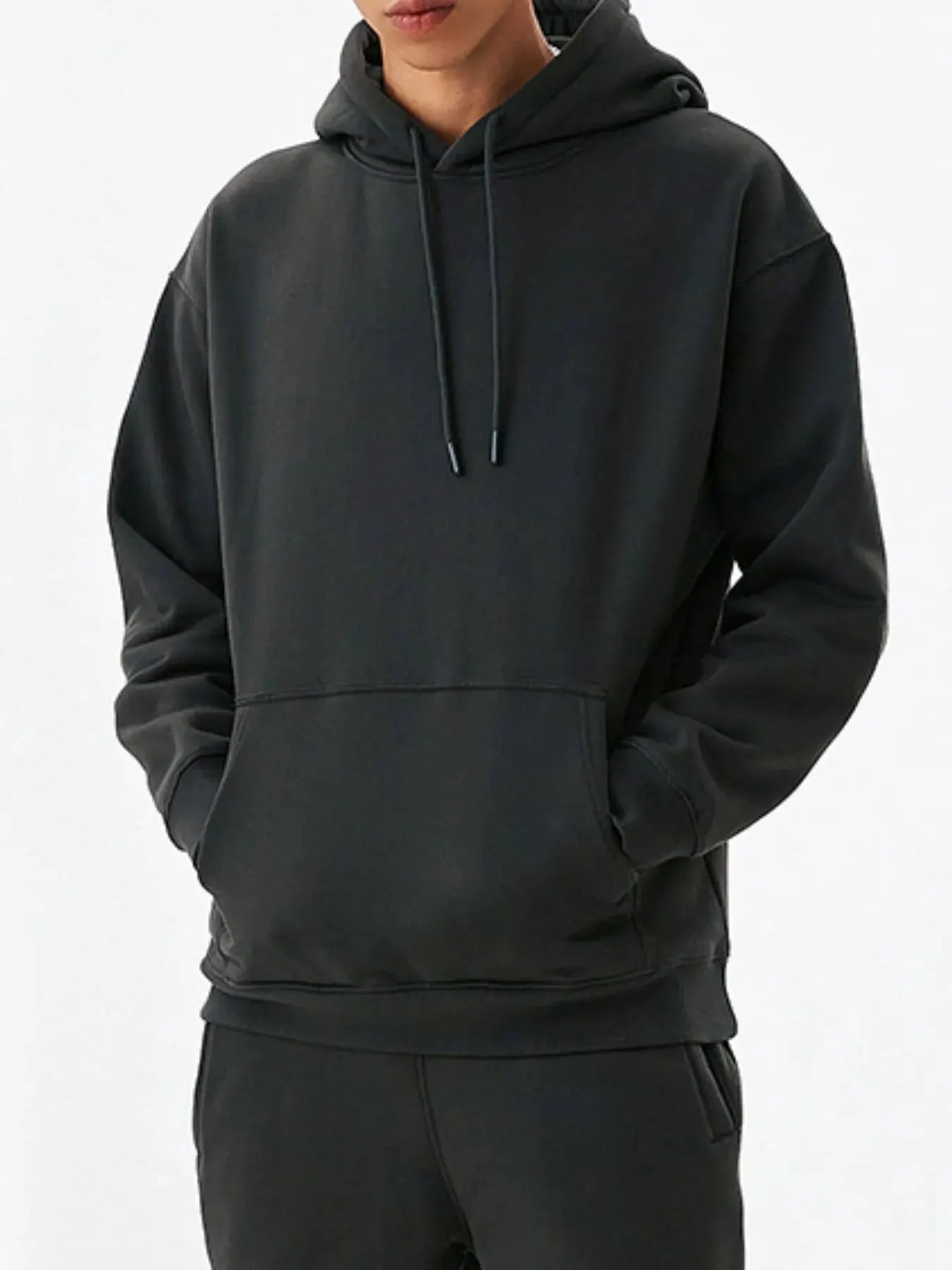 Men's Drawstring Kangaroo Pocket Long Sleeve Hoodie by Trendsi