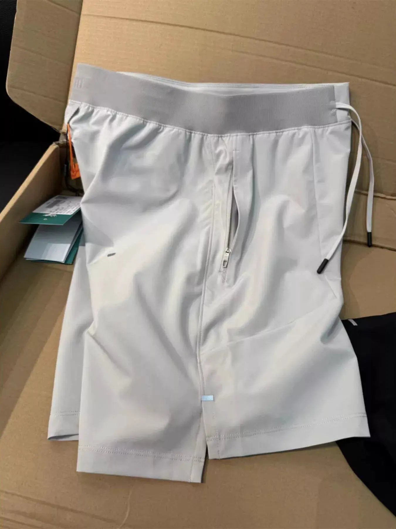 Men's Plus Size Lightweight Athletic Shorts with Drawstring Waist by Trendsi