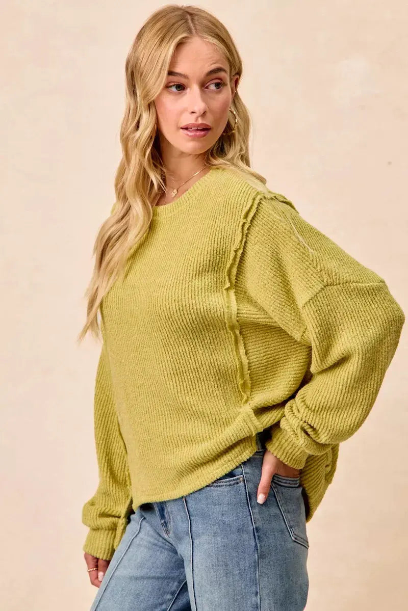 BiBi Boucle Rib Knit Uneven Hem Sweater With Open Seam by BiBi