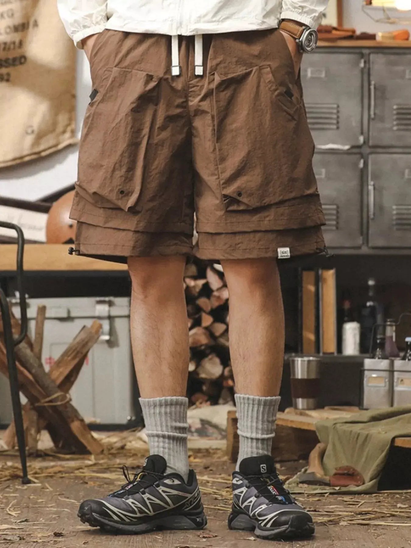 Men's Plus Size Multiple Pocket Layered Cargo Shorts with Drawstring Hem by Trendsi