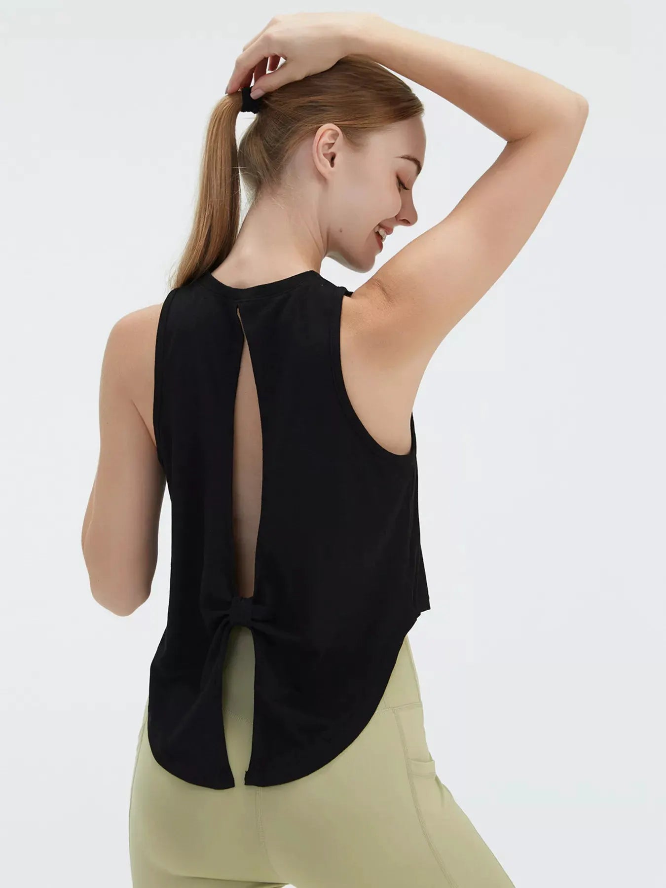 Cutout Back Round Neck Active Tank by Trendsi
