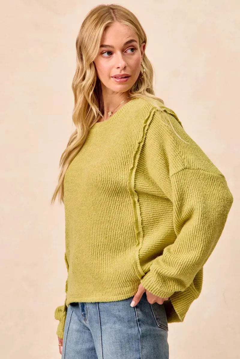 BiBi Boucle Rib Knit Uneven Hem Sweater With Open Seam by BiBi
