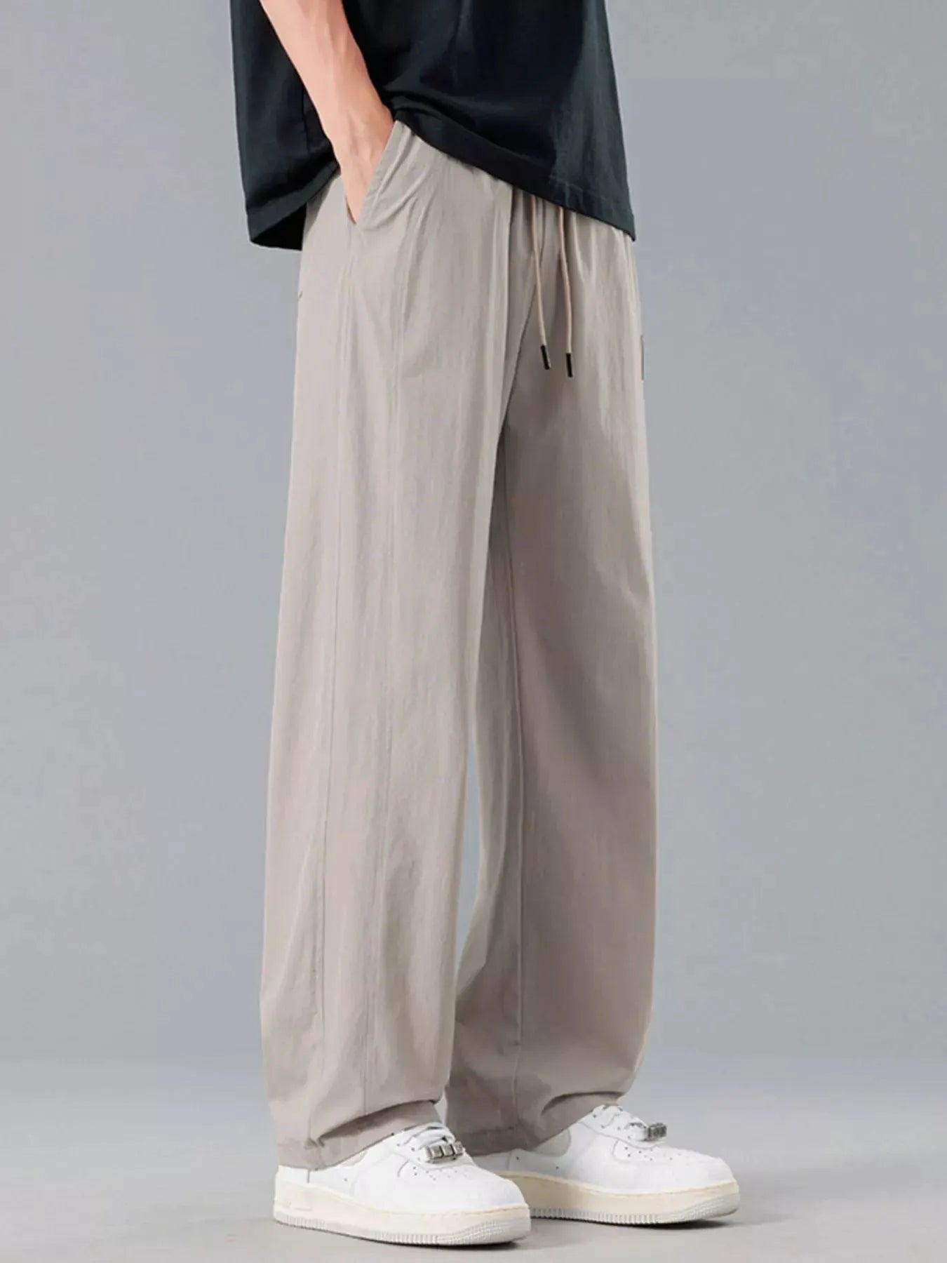 Men's Plus Size Loose Fit Drawstring Casual Pants by Trendsi