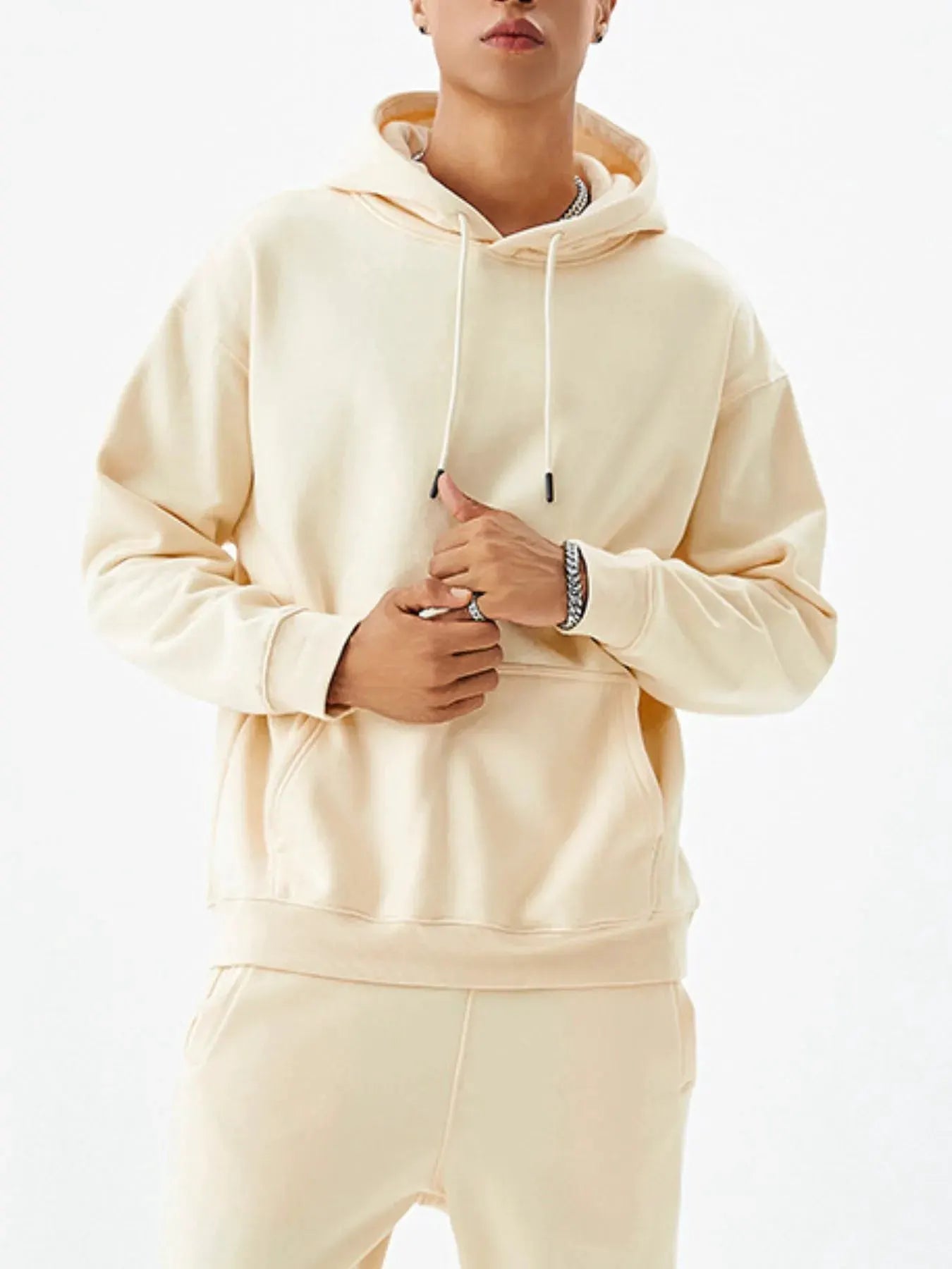 Men's Drawstring Kangaroo Pocket Long Sleeve Hoodie by Trendsi