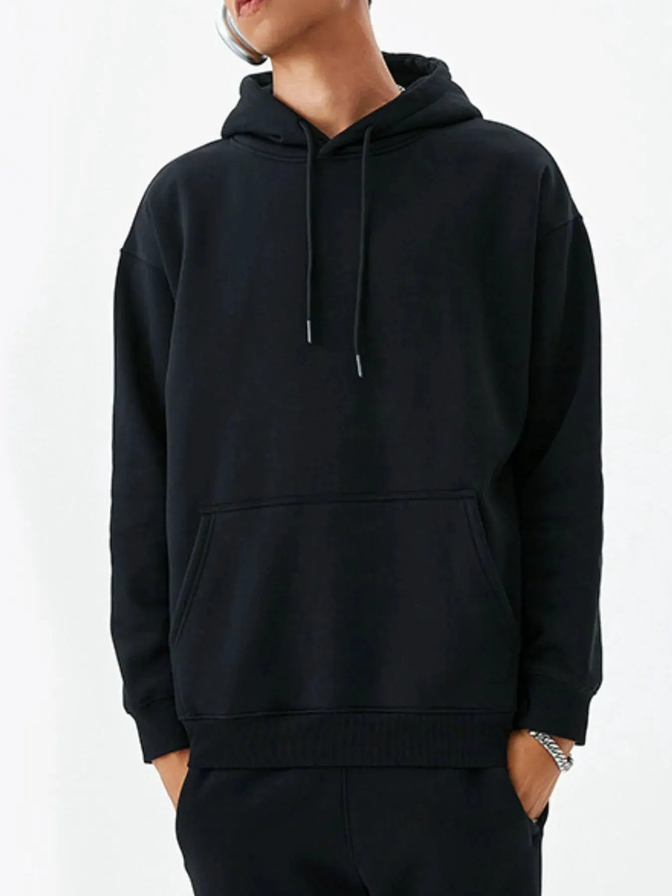 Men's Drawstring Kangaroo Pocket Long Sleeve Hoodie by Trendsi