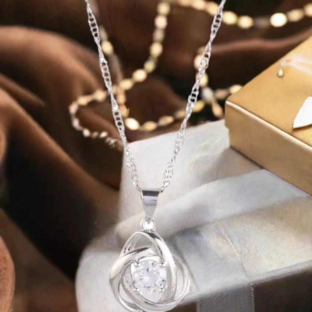 Round Knot Pendant Necklace with Cubic Zirconia by Nichestar
