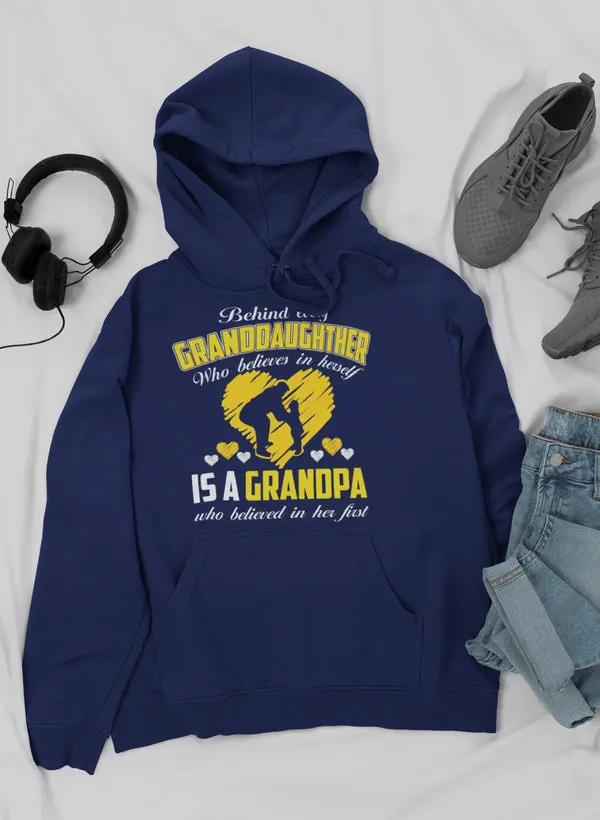 Behind Every Granddaughter Who Believes In Herself Is A Grandpa Hoodie by Merch