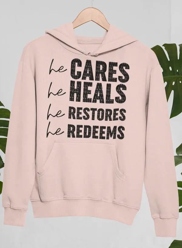 He Cares He Heals He Restores He Redeems Hoodie by Merch