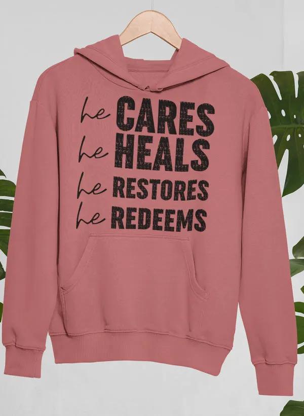 He Cares He Heals He Restores He Redeems Hoodie by Merch