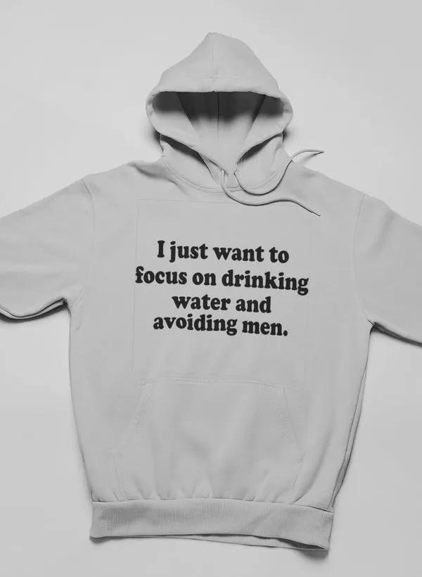 I Just Want to Focus On Drinking Water And Avoiding Men Hoodie by Merch