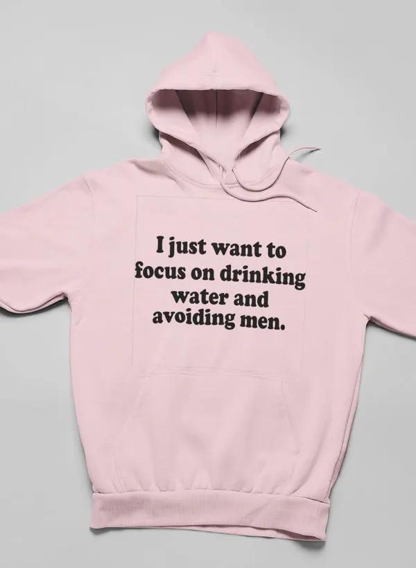 I Just Want to Focus On Drinking Water And Avoiding Men Hoodie by Merch