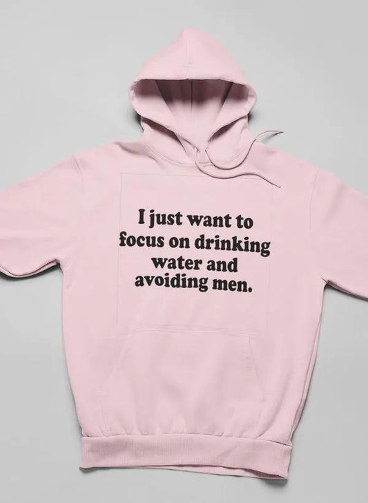 I Just Want to Focus On Drinking Water And Avoiding Men Hoodie by Merch