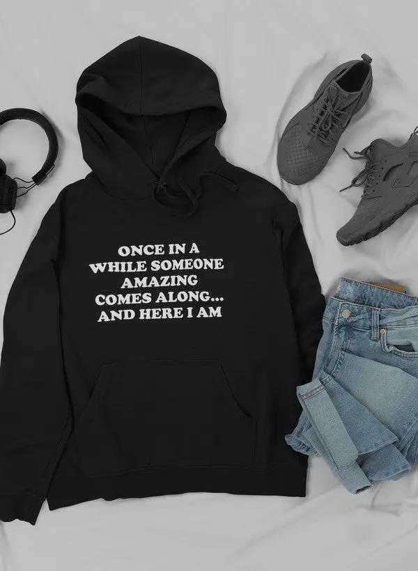 Once In A While Someone Amazing Comes Along And Here Hoodie by Merch