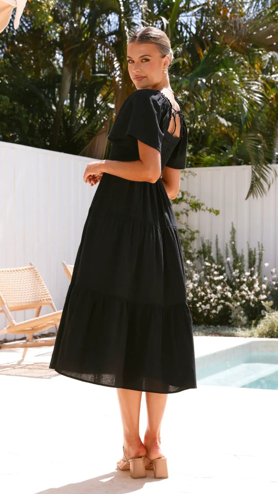 Black Linen Smocked Maxi Dress with Flutter Sleeves by Partner Label