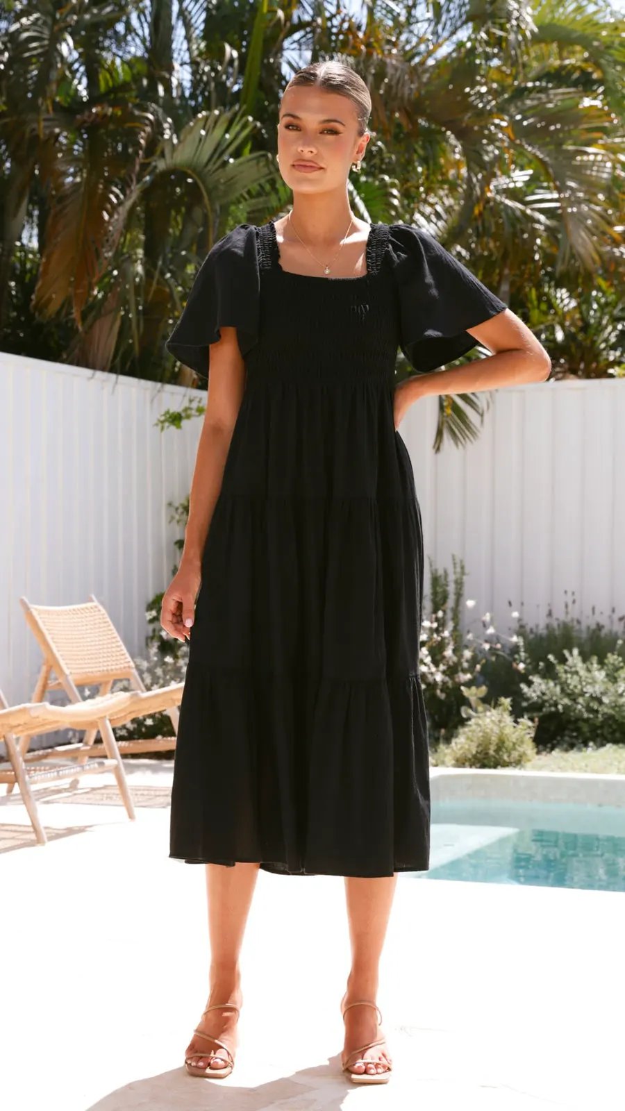 Black Linen Smocked Maxi Dress with Flutter Sleeves by Partner Label