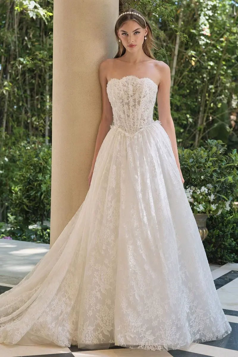 A-Line Wedding Gown With A Strapless Sweetheart Neckline And Intricately Embroidered Lace Bodice. by Tux-USA